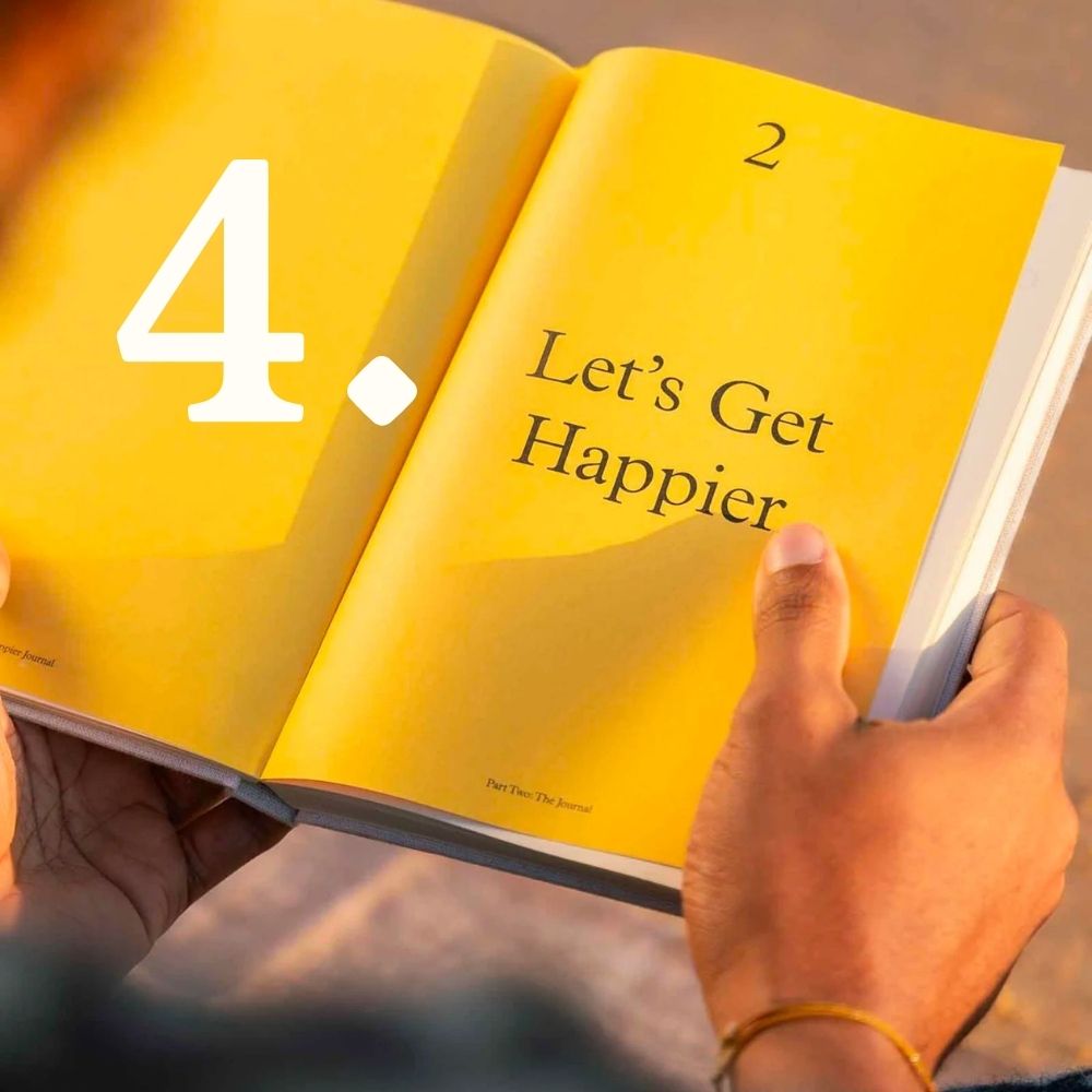 Hands holding Intelligent Change Journal | Papersmiths