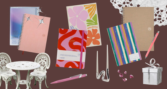 Bright winter 2025 stationery colours including mocha, orange, purple and red notebooks