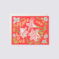 red Christmas card with envelope