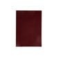Burgundy pocket sized notebook on a white background