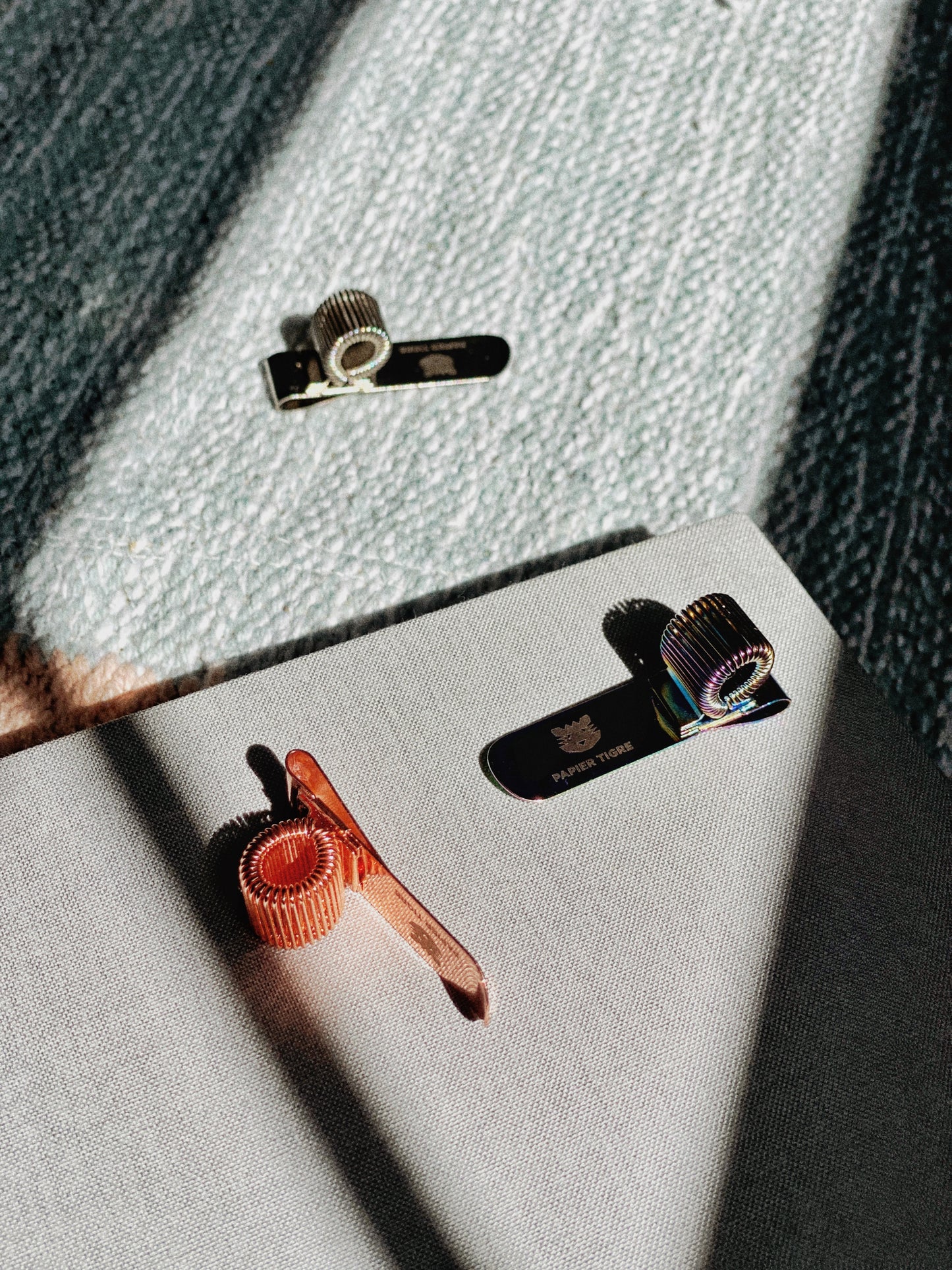 silver rose gold and iridescent pen clips