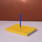 Yellow Notebook and Blue Pen